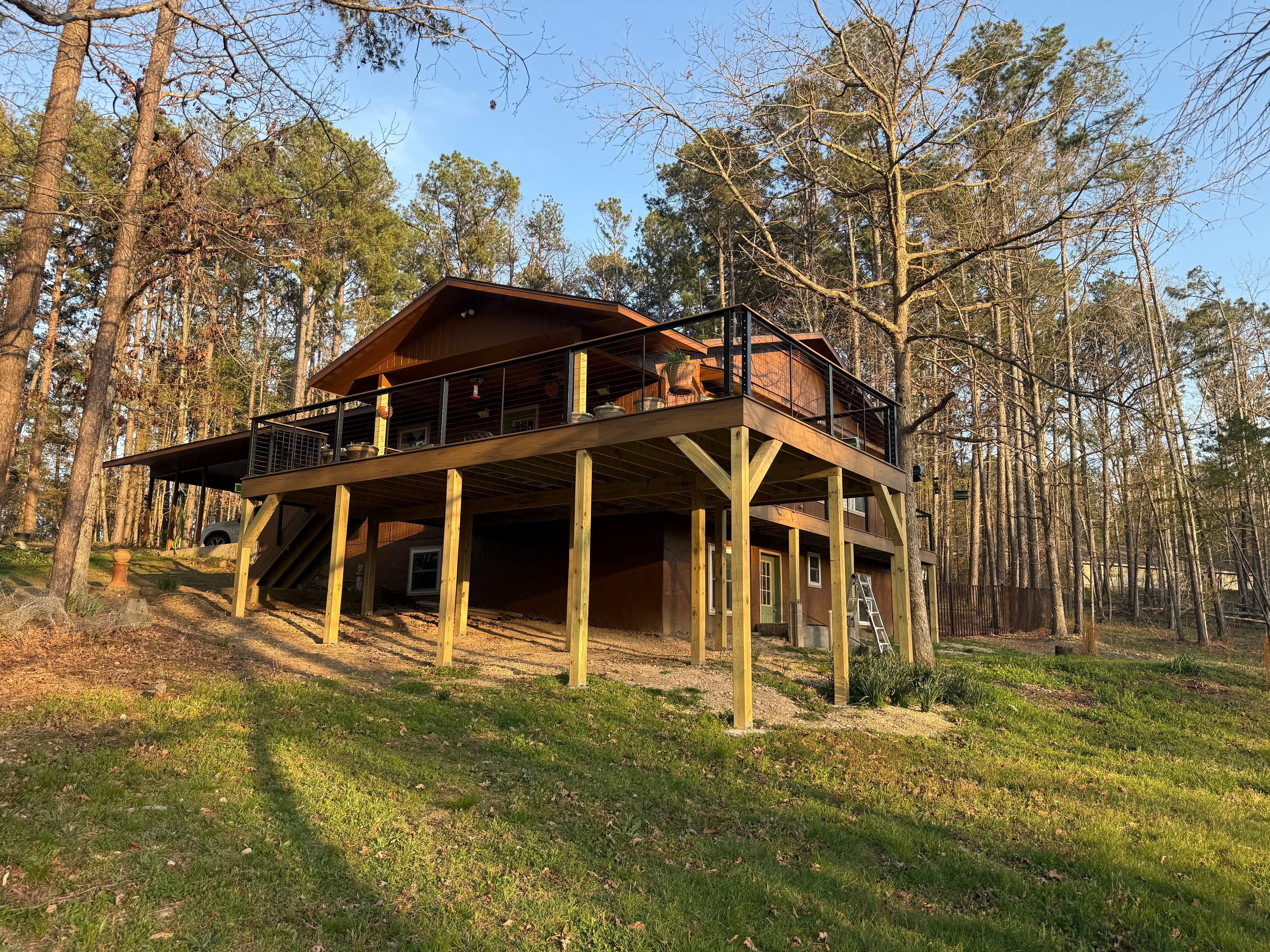 Project TimberTech Deck Addition in Tranquil Wooded Setting image
